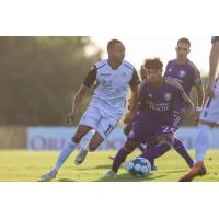 Winger Jamael Cox (left) with FC Tucson
