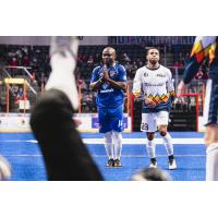 Leo Gibson of the Kansas City Comets (left) reacts after a goal against the Tacoma Stars