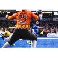 Kansas City Comets send a shot on goal against the Tacoma Stars