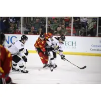 Wheeling Nailers defenseman Spencer Trapp (right) battles the Indy Fuel