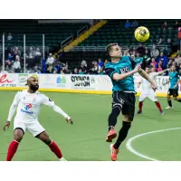 St. Louis Ambush defender Pepe Junqueira eyes the ball vs. the Kansas City Comets