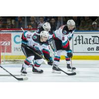 Kelowna Rockets right wing Dallon Wilton and defenceman Kaedan Korczak