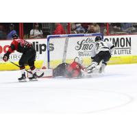 Cam Brown of the Wheeling Nailers (21) scores against the Cincinnati Cyclones