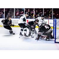 Peter Tischke (center) and Griffen Molino of the Utah Grizzlies test the Rapid City Rush defense