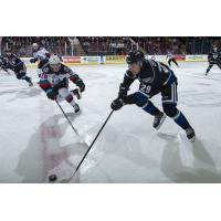 Kelowna Rockets left wing Liam Kindree (left) vs. the Victoria Royals