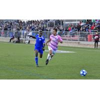 Forward Madison FC forward Jiro Barriga Toyama (right)