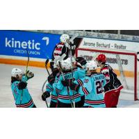 Columbus River Dragons celebrate against the Port Huron Prowlers