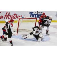 Vancouver Giants goaltender David Tendeck eyes the puck vs. the Spokane Chiefs