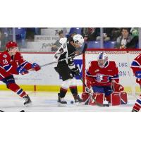 Vancouver Giants centre Justin Sourdif challenges the Spokane Chiefs