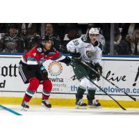 Kelowna Rockets defenceman Devin Steffler (left) vs. the Everett Silvertips