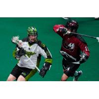 Saskatchewan Rush forward Robert Church (left) vs. the Colorado Mammoth