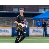 Forward Madison FC goalkeeper Brandon Barnes