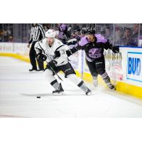 Jake Walman of the San Antonio Rampage controls the puck against the Colorado Eagles