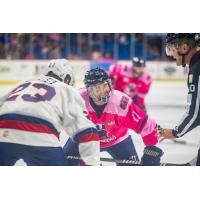 Tulsa Oilers left wing Danny Moyniham faces off with the Kalamazoo Wings
