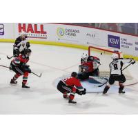 Vancouver Giants centre Tristen Nielsen (right) takes a shot against the Kelowna Rockets