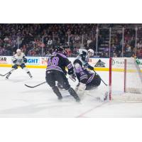 Joey LaLeggia of the San Antonio Rampage (back) scores game-winning goal against the Colorado Eagles