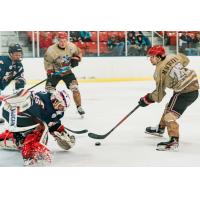 New Jersey Titans forward Mitch Machlitt (right) vs. the Johnstown Tomahawks