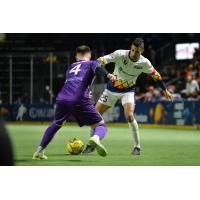 Danny DiPrima of the Harrisburg Heat defends against the Tacoma Stars
