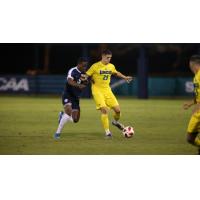 Defender Danny Reynolds with UNC Wilmington