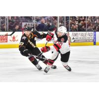 Cleveland Monsters center Stefan Matteau (left) vs. the Binghamton Devils