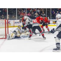 San Antonio Rampage goaltender Ville Husso holds the lead with a late save on Tyler Sikura of the Rockford IceHogs