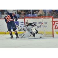 Vancouver Giants goaltender David Tendeck stops a Kamloops Blazers' penalty shot