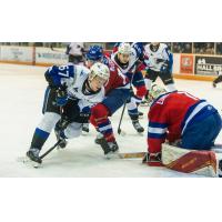 Saint John Sea Dogs left wing Dawson Stairs (left) vs. the Moncton Wildcats