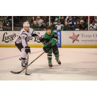 Andreas Borgman of the San Antonio Rampage (left) challenges Texas Stars forward Joel L'Esperance