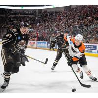 Lehigh Valley Phantoms forward Isaac Ratcliffe with the puck against the Hershey Bears