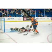 Robby Jackson of the Tulsa Oilers scores vs. the Kansas City Mavericks