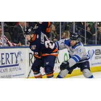 Cedric Lacroix of the Greenville Swamp Rabbits (left) vs. the Jacksonville IceMen