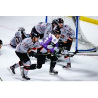 Utah Grizzlies forward Mitch Maxwell battles the Kansas City Mavericks