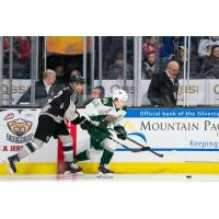 Vancouver Giants centre Justin Sourdif (left) against the Everett Silvertips