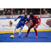 Ontario Fury defender Uzi Tayou (right) vs. Leo Gibson of the Kansas City Comets