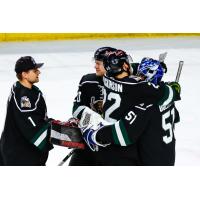 Utah Grizzlies goaltender Martin Ouellette receives congratulations after a shutout
