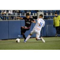 Seattle Sounders FC forward Raul Ruidiaz (left) vs. CD Olimpia