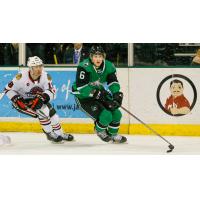 Texas Stars defenseman Ben Gleason (right) vs. the Rockford IceHogs
