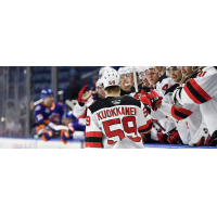Janne Kuokkanen along the Binghamton Devils bench