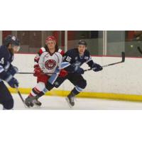 Forward Steven Fowler (right) with the Mentor Ice Breakers