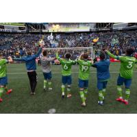 Seattle Sounders FC salutes its fans following a 2-1 win over Chicago in Sunday's season opener