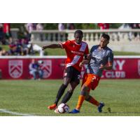Malyk Hamilton (left) with Cavalry FC