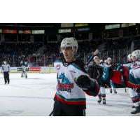 Kelowna Rockets exchange fist bumps after a score