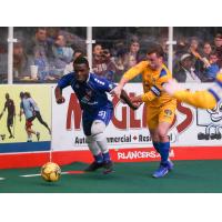 Kansas City Comets defender Robert Palmer (left) vs. the Rochester Lancers