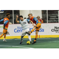 St. Louis Ambush defender Axel Duarte (center) vs. the Florida Tropics