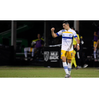 San Jose Earthquakes midfielder Cristian Espinoza celebrates his game-winning goal