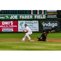 Jack Walker of the St. Cloud Rox trying to turn two