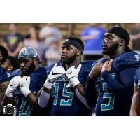 Massachusetts Pirates defensive lineman Willie Yarbary (middle)
