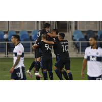 The San Jose Earthquakes celebrate Andy Rios' goal