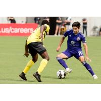 Louisville City FC midfielder Oscar Jimenez with possession vs. Pittsburgh Riverhounds SC