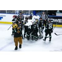 Utah Grizzlies react after a win